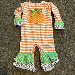 Pumpkin onesie.